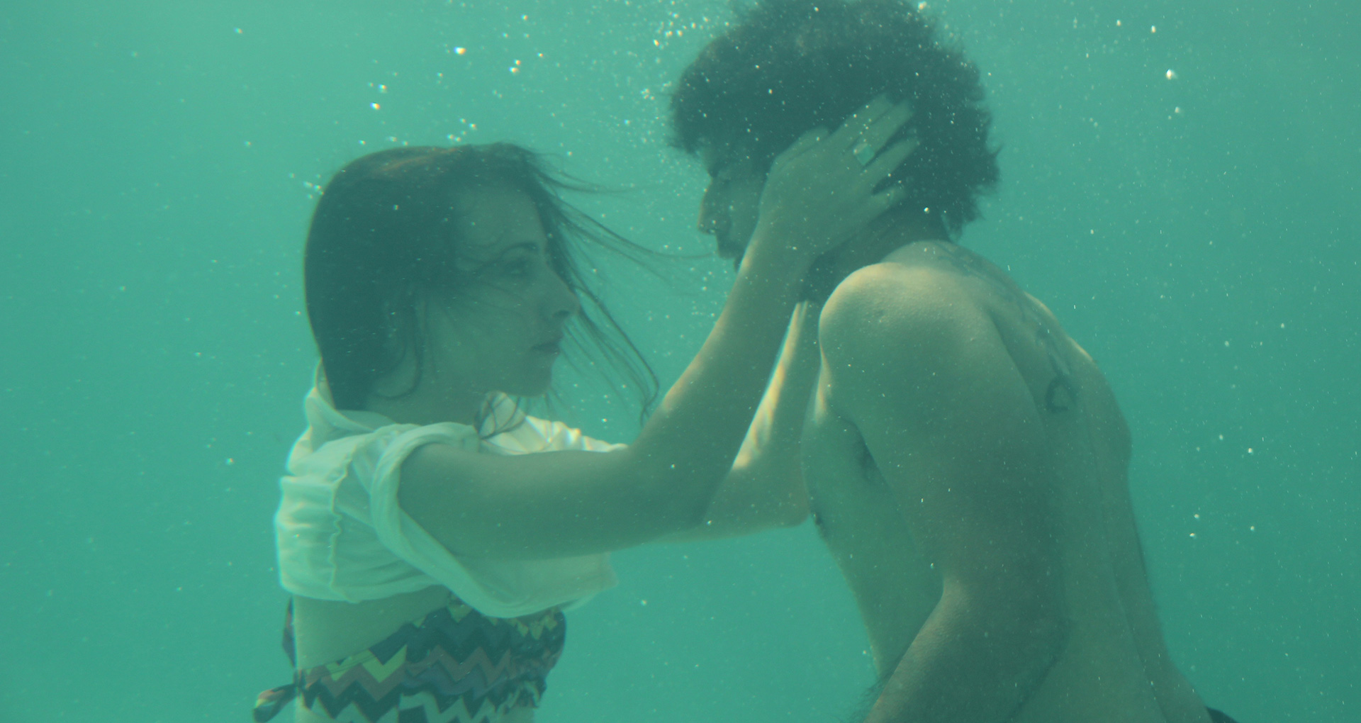 the young woman and the guy under water